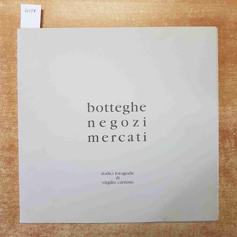 BOTTEGHE NEGOZI MERCATI dodici fotografie di VIRGILIO CARNISIO gruppo immagine