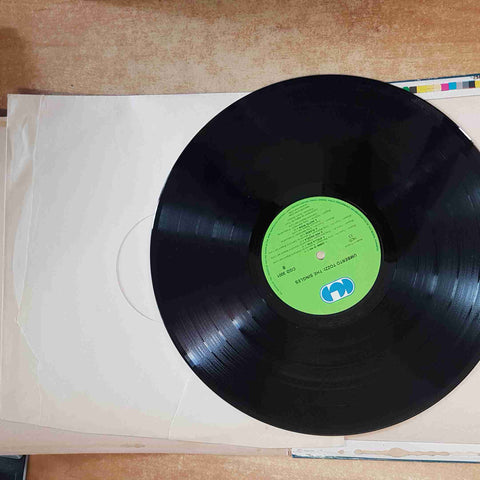 UMBERTO TOZZI - SINGLES LP 33 GIRI CGD 1983 ALBUM VINILE VINYL gloria ti amo EVA